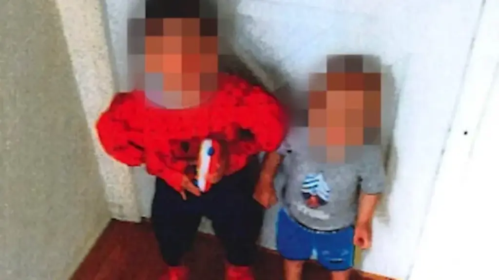 Brothers L.L., left, and J.L., 16 months younger, are seen in an undated photo. Becky Hamber, 46, and Brandy Cooney, 44, are charged in L.L.'s death on Dec. 21, 2022, and have been accused of torturing and confining J.L. Both have pleaded not guilty
